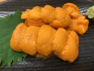 ���J��